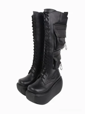Black gothic lolita platform boots with round toe and cargo pockets shown as a paired front view with lace-up design and chunky wedge heel on white background