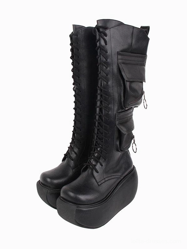 Black gothic lolita platform boots with round toe and cargo pockets shown as a paired front view with lace-up design and chunky wedge heel on white background