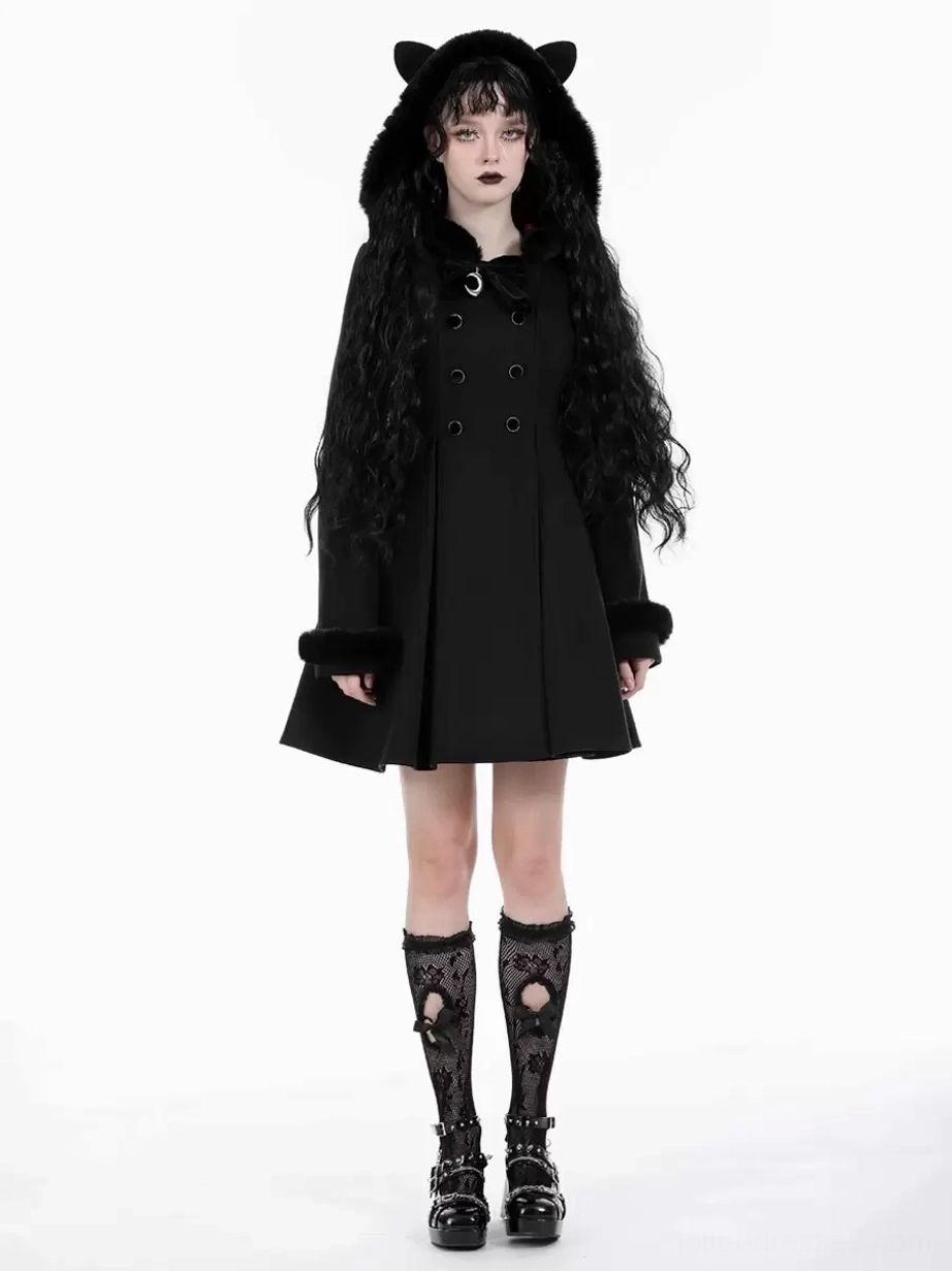 Black Gothic Lolita coat front full-body standing pose with fur-trimmed cuffs and double-breasted button details on female model