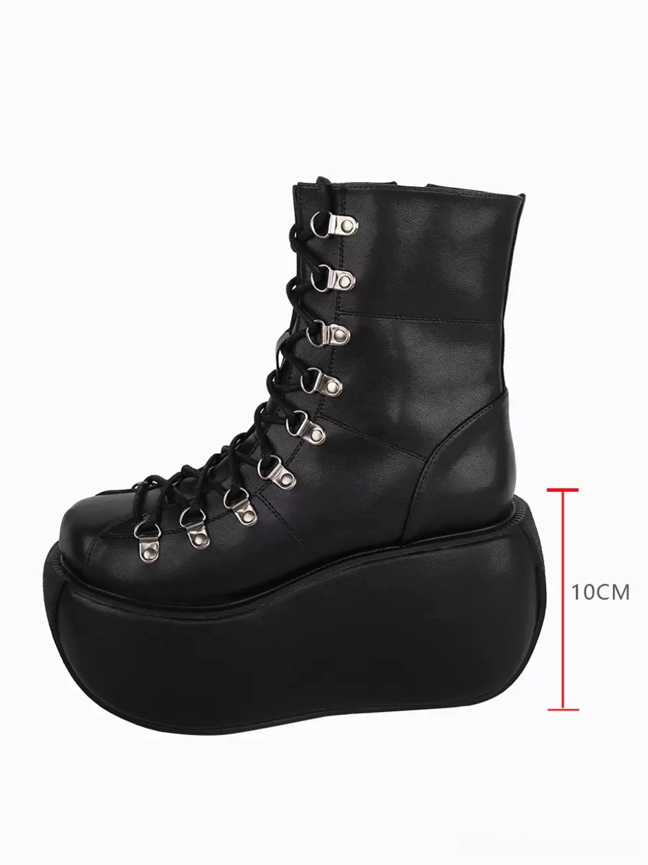 Single black gothic lolita platform boot left side three-quarter showing 10cm marked platform height and lace-up closure