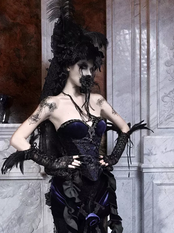 Black gothic lolita corset bustier detail shot showcasing crystal embellishments and premium velvet fabric with intricate lace-up closure