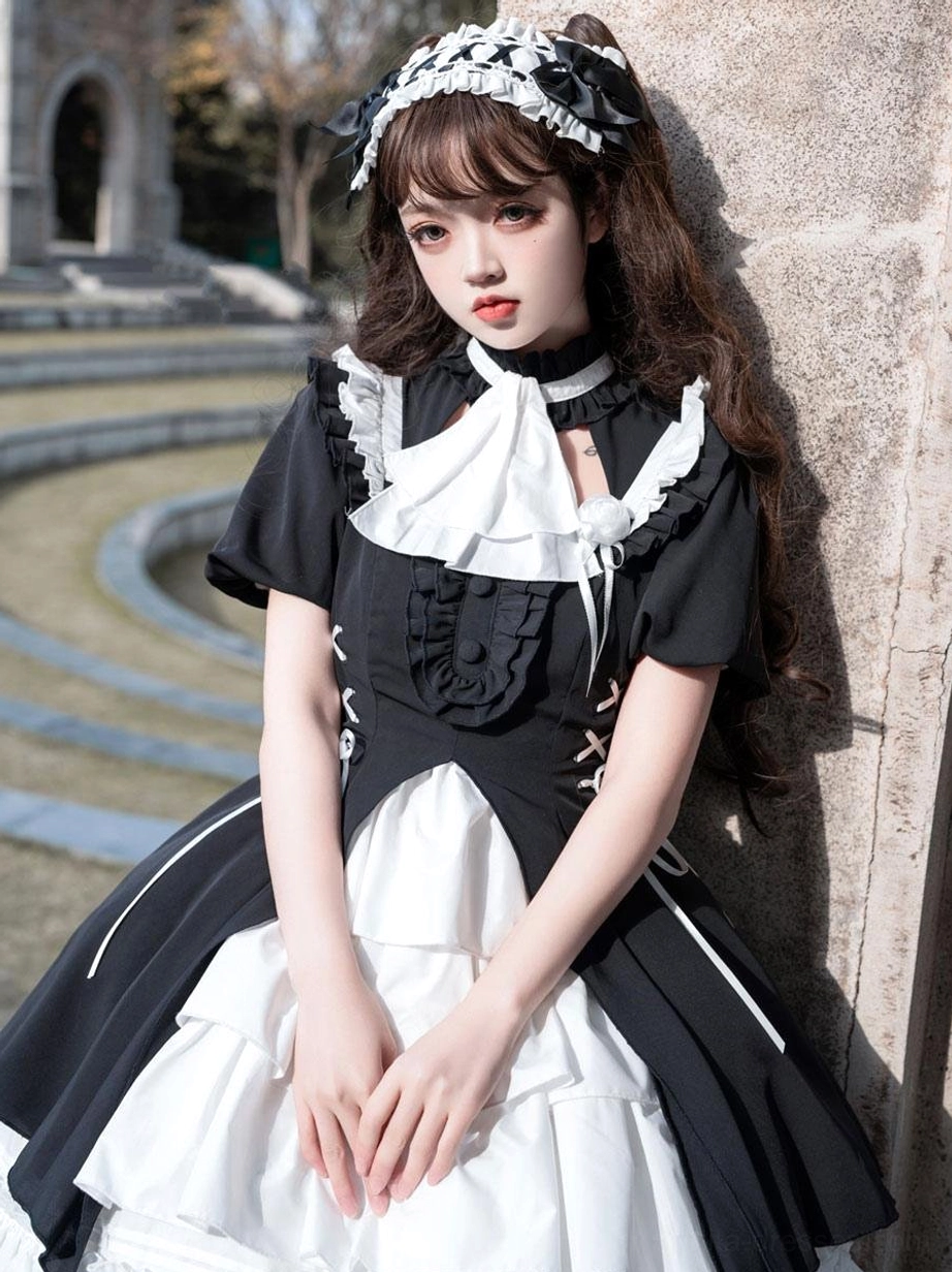 Black gothic lolita dress additional detail view showcasing overall construction quality, ruffled embellishments, and dark romantic aesthetic