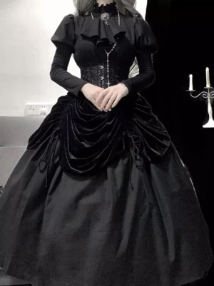 Black gothic Lolita dress front close-up detail view featuring long sleeves, corset waist shaping, structured ruffled collar, and full floor-length pleated skirt