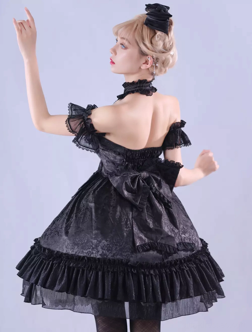 Black Gothic Lolita sleeveless dress detail showcase featuring jacquard woven pattern, ruffled hem layers, and lace embellishment elements