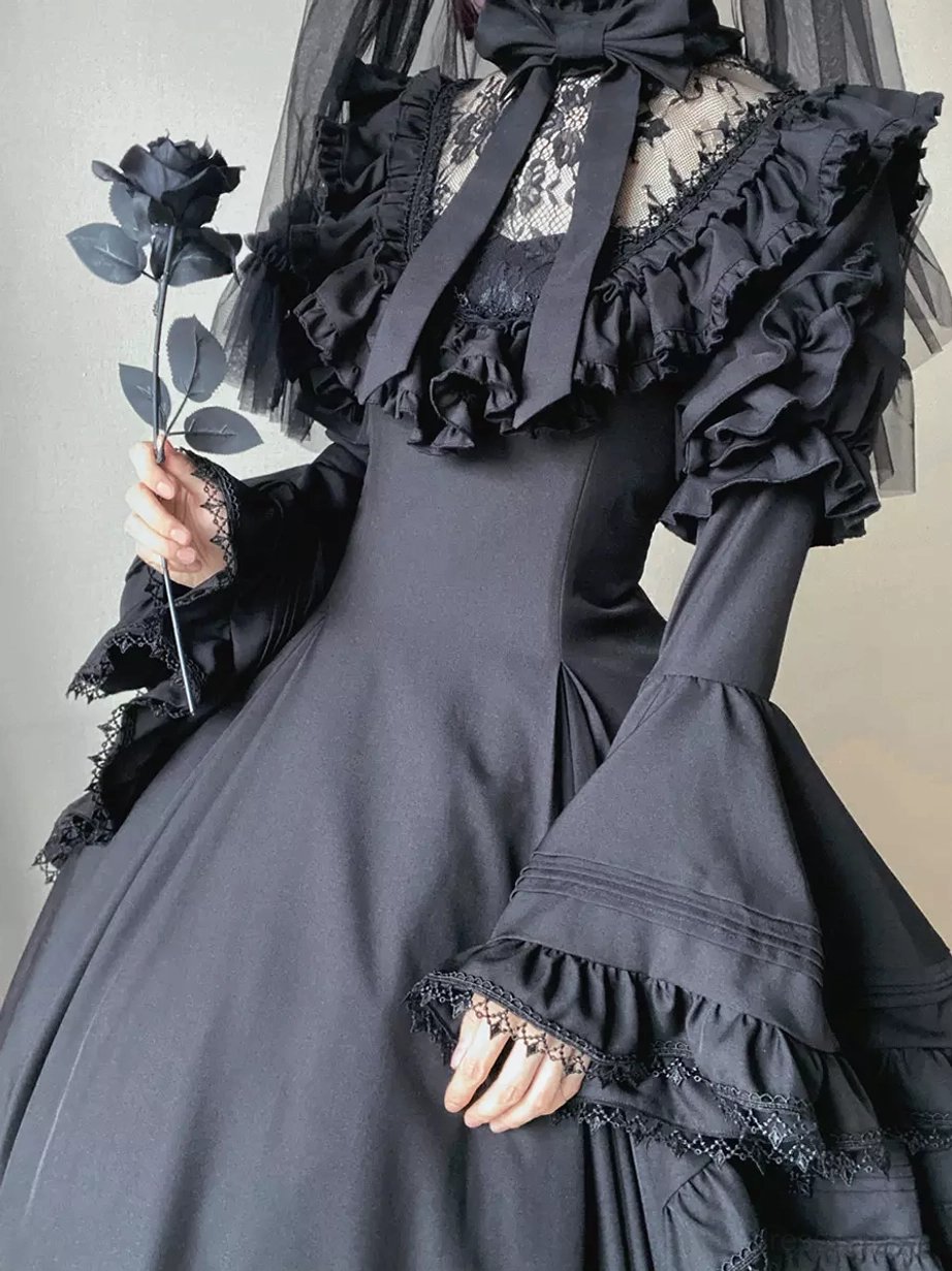 Black gothic lolita dress with lace neck panel ruffled collar bell sleeves styled with black rose
