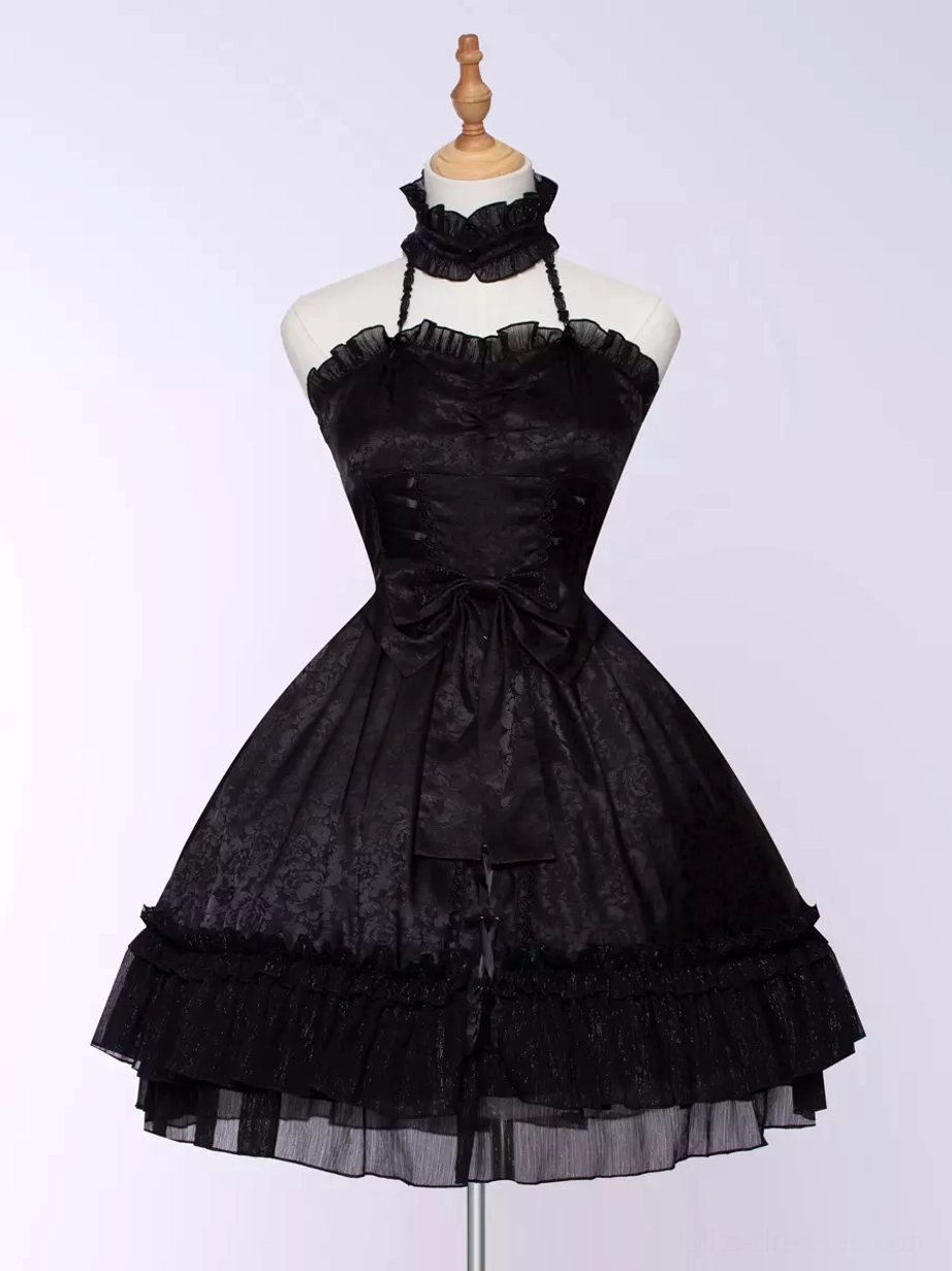 Black Gothic Lolita dress layered ruffled skirt hem and volume construction detail showcasing dramatic movement potential