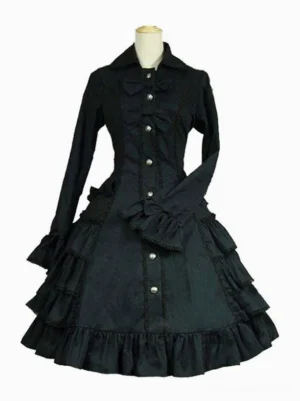 Black Gothic Lolita long-sleeve dress front full-body view featuring tiered ruffled skirt, pearl-style buttons, chest bow accent, and flared ruffled cuffs on dress form