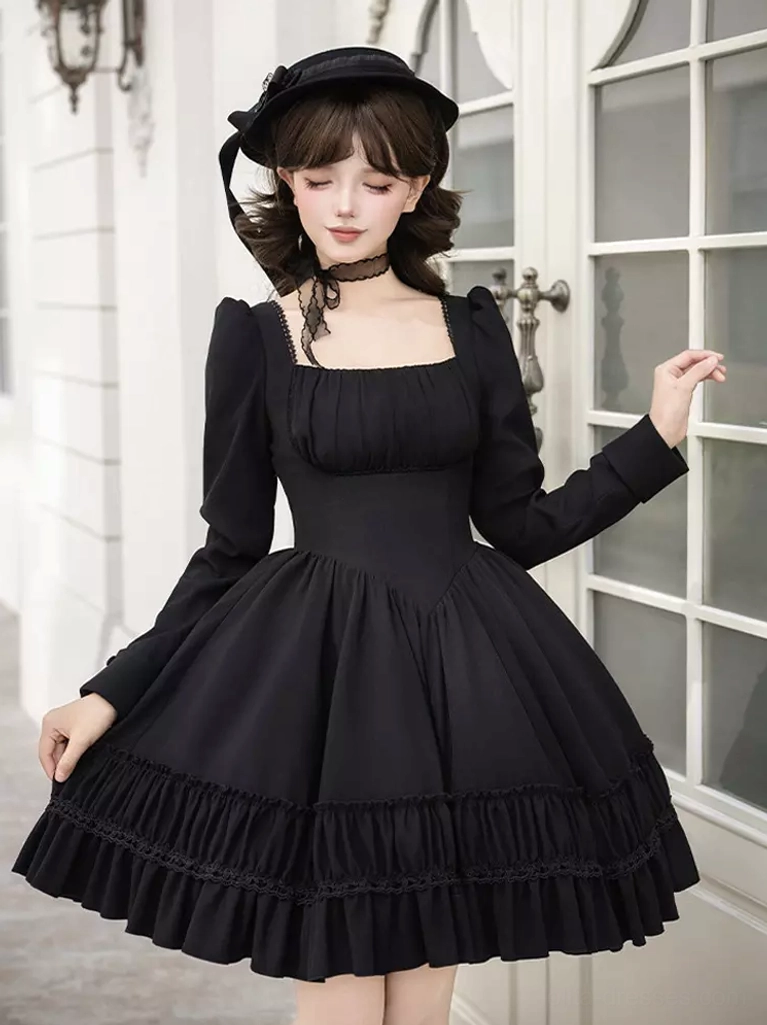 Gothic Lolita black dress front three-quarter angle showing square puff sleeves, fitted waist, tiered ruffled skirt, and black choker detail on model