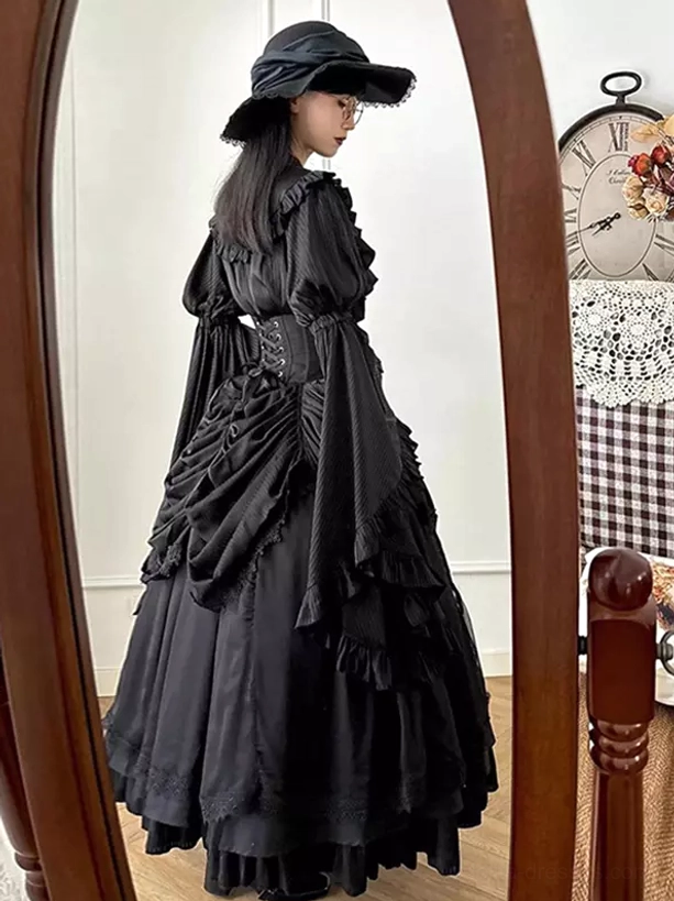 Black Gothic Lolita dress side-back view displaying ruched and tiered skirt construction, fitted waist definition, and elegant puffed bishop sleeve silhouette with lace accents