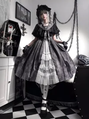 Black gothic lolita two-piece dress and shawl set front view with tiered ruffled lace skirt and coordinating accessories