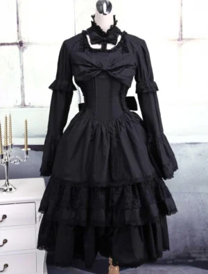 Black Gothic Lolita dress full front view showing tiered ruffled skirt, corset bodice, high lace collar and chest bow detail