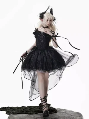 Three-quarter front view of black gothic lolita dress set showcasing structured corset bodice, detachable arm ribbons, lace bodice panels, feathered headwear accessory, and dramatic tulle skirt layers