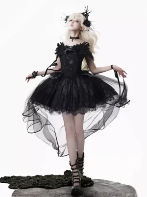 Black gothic lolita dress set front full-body view featuring off-shoulder lace-up corset bodice with high-low hemline, feather-trimmed neckline, matching black choker, feathered headwear, and flowing tulle train
