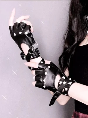 Black gothic lolita fingerless leather gloves with pyramid rivets and adjustable buckle strap worn on wrist, side view showing rivet details and metal embellishments