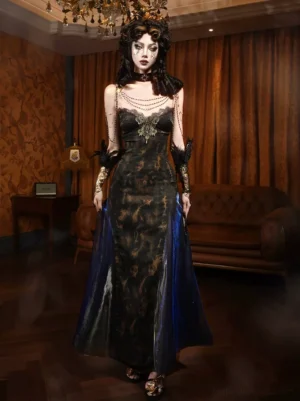 Black gothic lolita evening gown with gold metallic patterned fabric fit-flare silhouette front full-body view model wearing feather wrist cuffs chain jewelry spaghetti straps