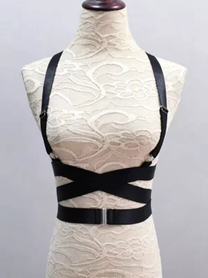 Black Gothic Lolita harness bustier front view with crisscross straps and silver metal buckle hardware on dress form