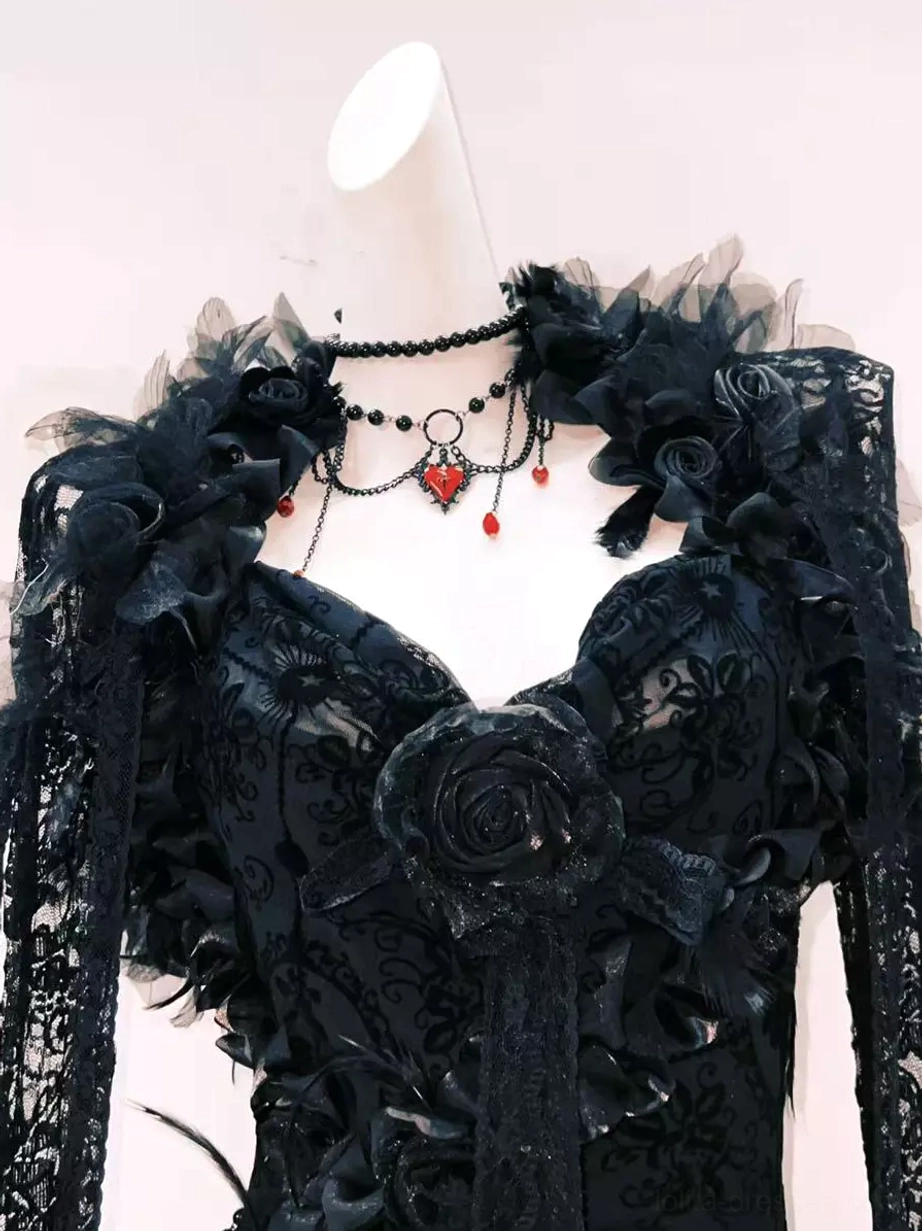 Black gothic lolita gown front close-up detail of large 3D rose applique sheer lace fabric and layered floral trims
