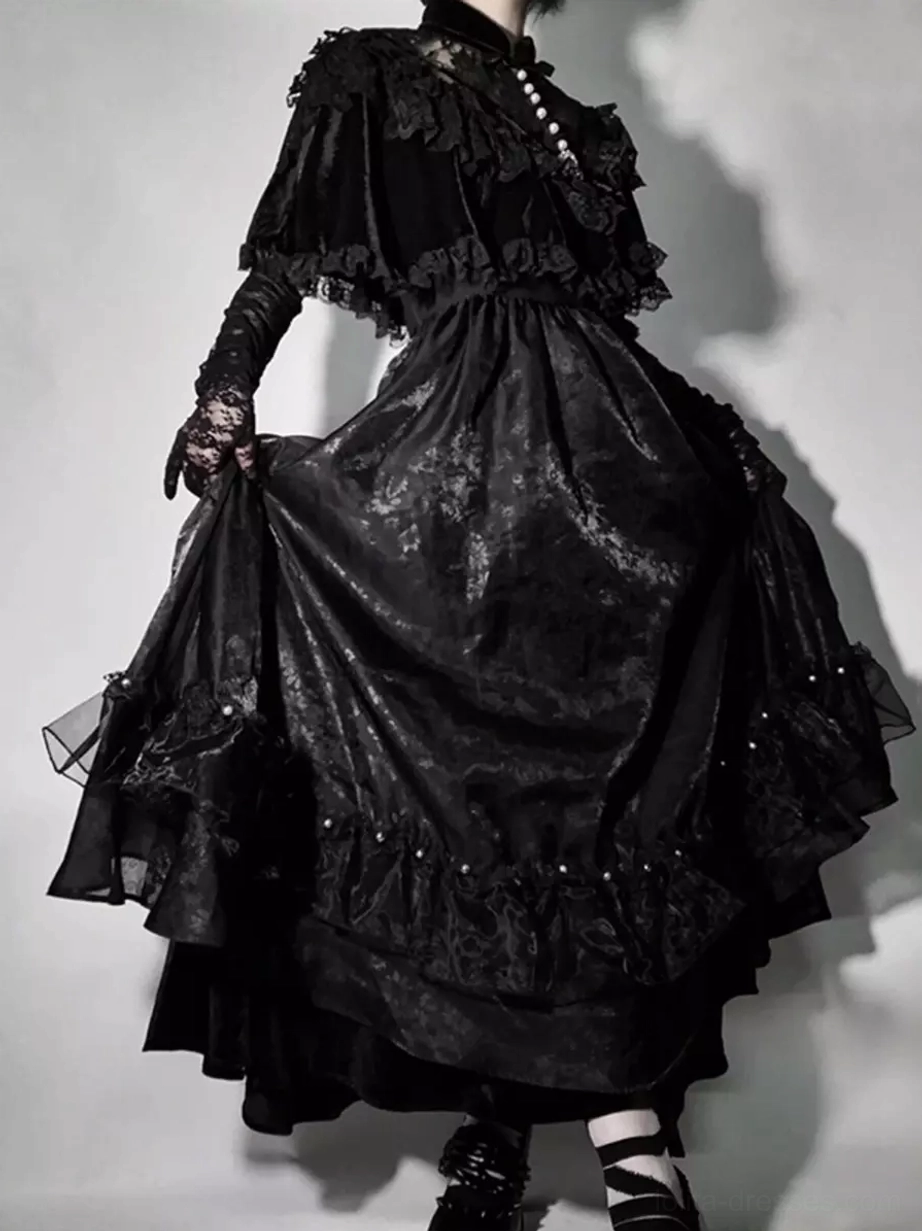 Black gothic lolita JSK dress front three-quarter view showing pearl neck trim gathered waist shiny jacquard layered skirt
