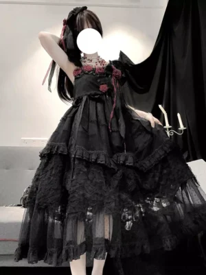Black gothic lolita sleeveless jsk dress with tiered ruffled skirt and red rose embellishment full body side view
