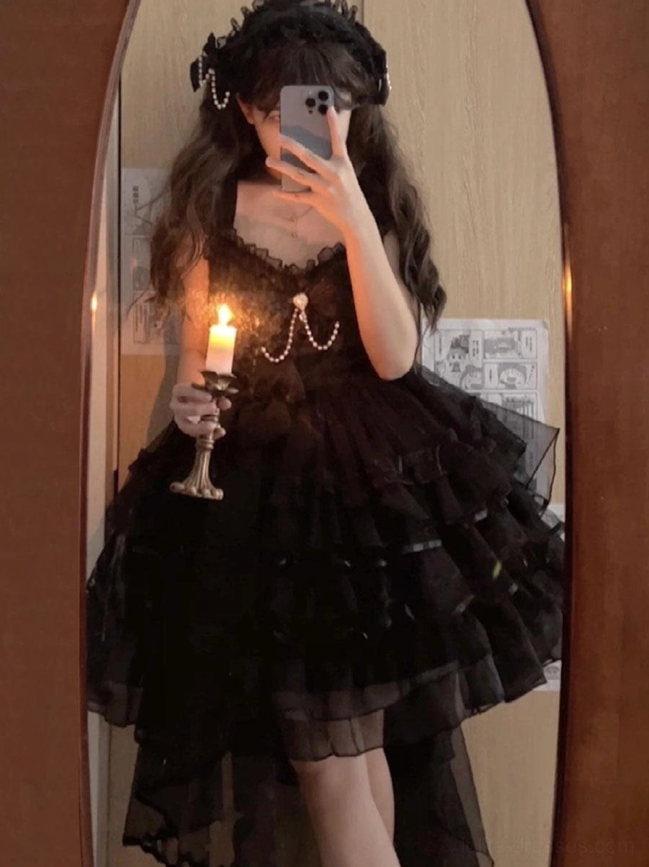 Black gothic lolita headpiece with lace bow headband worn in mirror selfie view, featuring ruffled tulle skirt and pearl chain decoration, alternative lolita styling inspiration