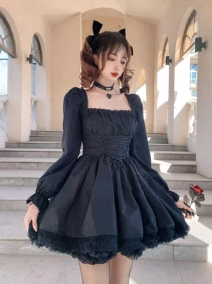 Black gothic lolita lace-up corset dress with square neckline, voluminous puff sleeves, and layered lace ruffle hem - full front view on model