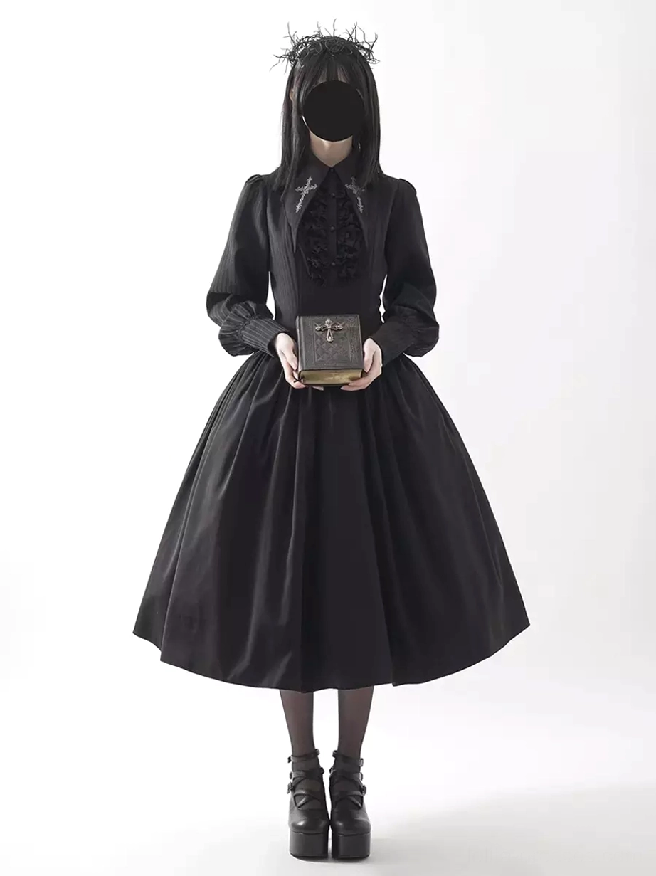 Black Gothic Lolita long sleeve ruffle midi dress front full-body view, featuring cascading chest ruffles, puff sleeves, high-waisted silhouette, and flowing A-line skirt on model holding vintage book