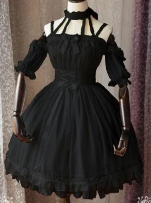 Black Gothic Lolita one-piece dress with ruffled hem and bust bow decoration, short sleeves and cold-shoulder halter strap design displayed on mannequin front view