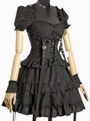 Black Gothic Lolita one-piece dress with sweetheart neckline and ruffled trim, featuring corset lace-up front, puff short sleeves, and multi-layer ruffled skirt, front view on mannequin
