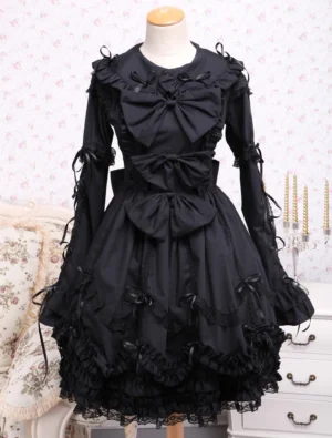 Black Gothic Lolita OP dress with turndown collar and satin bows front three-quarter view on model