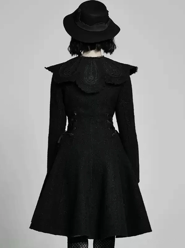 Back view of black gothic lolita overcoat showing embroidered ruffled rear collar, side lace-up waist details, flared midi skirt, full-length styling demonstration