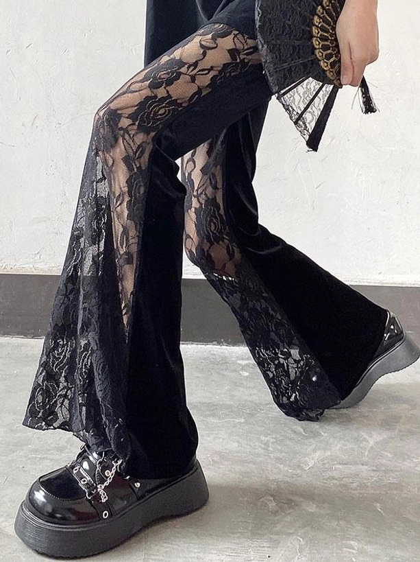 Dual-layer black gothic lolita pants, side walking view, solid velvet one side floral lace other side, platform loafers, lace fan