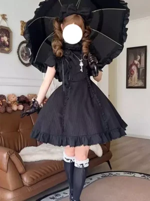 Black gothic lolita dress with pinstripe pattern and ruffled collar front view full outfit styling with twin curly hair parasol