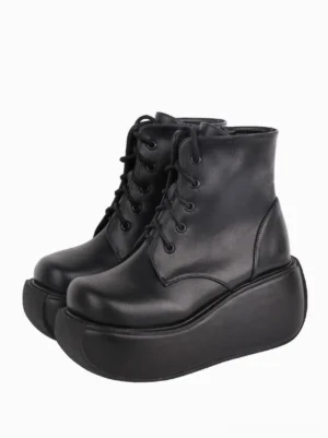 Black Gothic Lolita platform ankle boots three-quarter front view showing smooth PU leather finish, round toe, and ultra-thick platform sole perfect for authentic Lolita fashion coordination