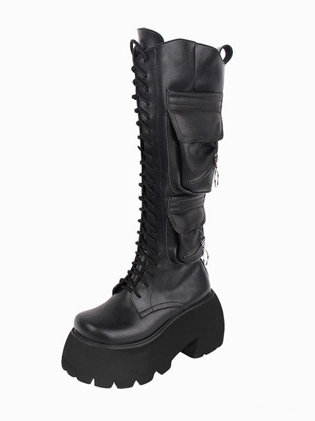 Black Gothic Lolita platform boots left front three-quarter view showing round toe and front lace-up design with dual cargo pockets and metal zipper rings on plain white background