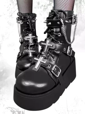 Black Gothic Lolita platform boots with round toe, silver cross hardware and chain buckle straps, front close-up view showcasing matte PU leather and metal rivet details