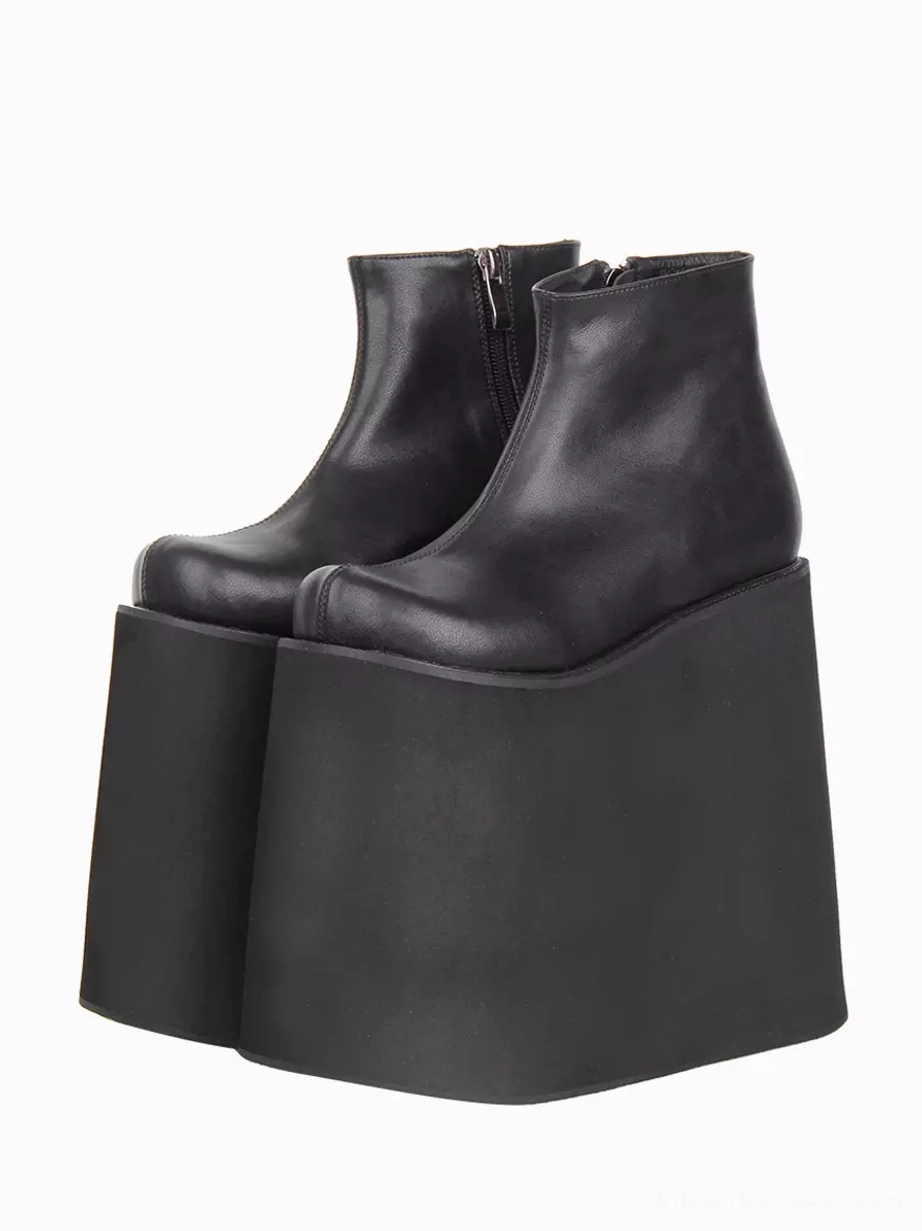 Black Gothic Lolita platform boots front three-quarter view showing round toe design, side metal zipper, and ultra-thick 18cm wedge sole