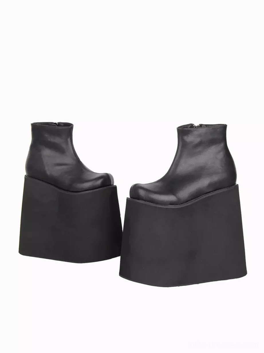 Overhead view of black Gothic Lolita platform boots showing smooth PU leather finish, compact silhouette, and round toe shape