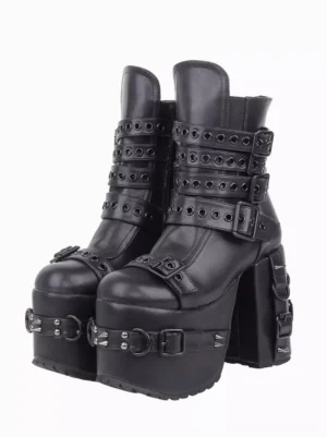 Black gothic lolita platform boots with metallic rivet embellishments and chunky wedge heel, front three-quarter view showcasing eyelet buckle straps and spike details