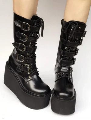 Gothic lolita boots side angle view showing chunky wedge heel and metal buckle strap details