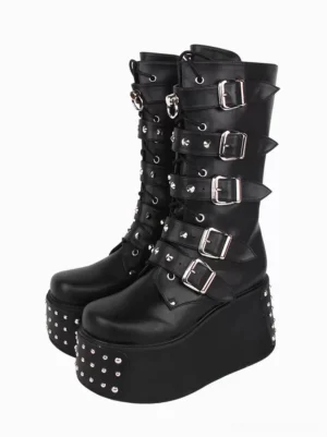 Black Gothic Lolita platform boots front three-quarter view showing silver metallic grommets buckle straps round toe and studded studded platform sole