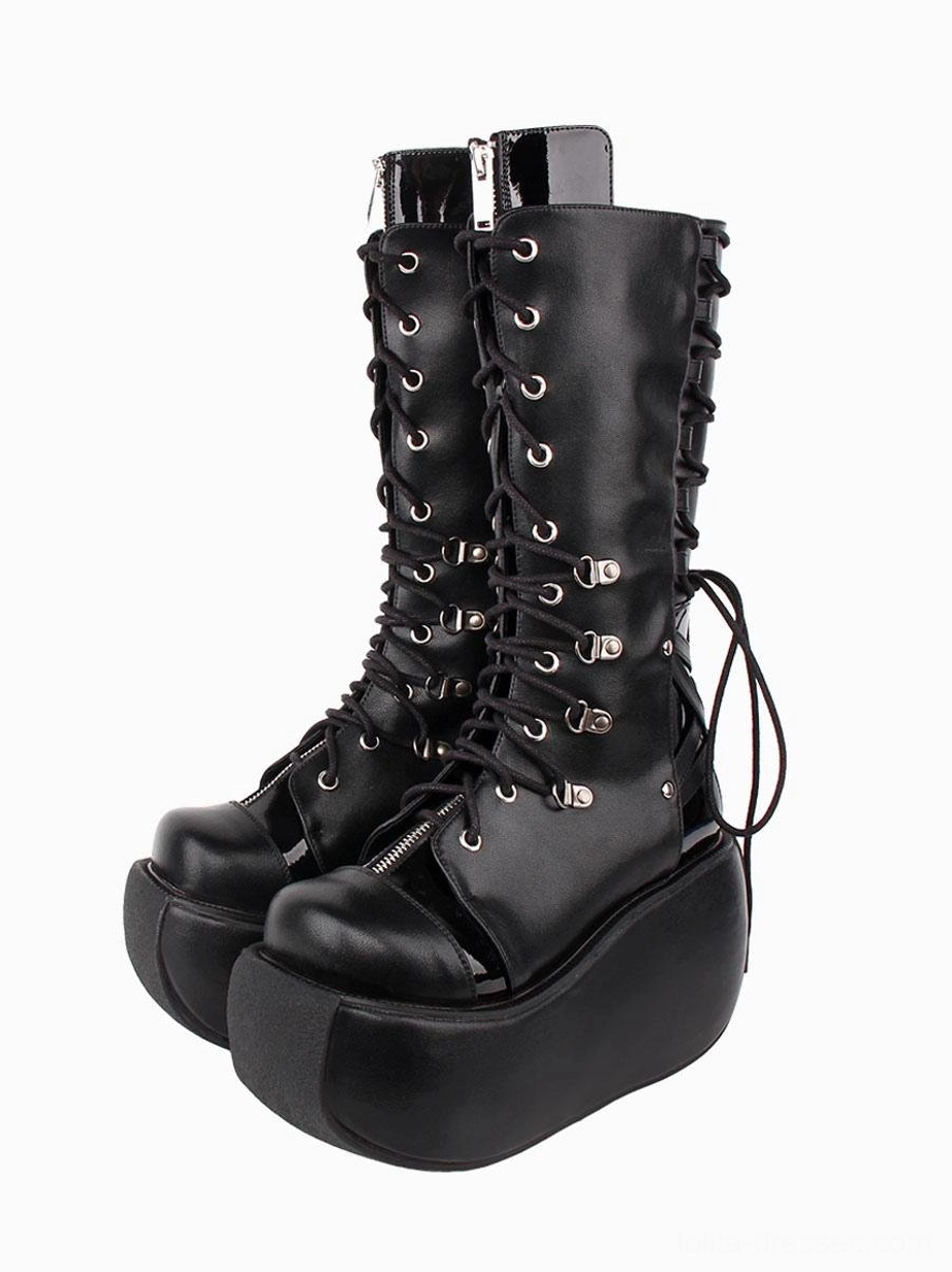 Black gothic lolita platform boots front view with silver grommets and lace-up corset design, chunky platform sole, polished metal hardware