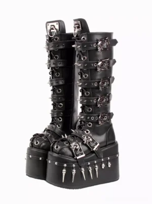 Black gothic lolita platform boots front double-side view showing skull buckles and spike studs on thick wedge sole with round toe design