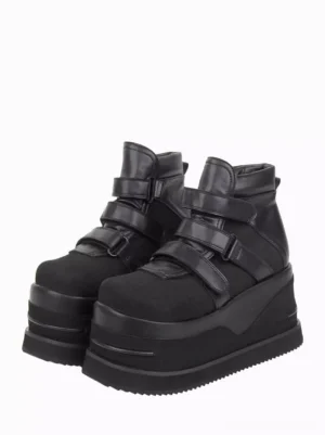 Black Gothic Lolita platform boots front three-quarter view showing triple velcro straps, round toe design, and ultra-thick wedge sole on paired shoes