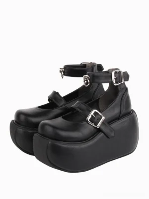 Black Gothic Lolita platform Mary Jane shoes with dual silver buckle straps front three-quarter view showing thick wedge sole and matte PU leather finish