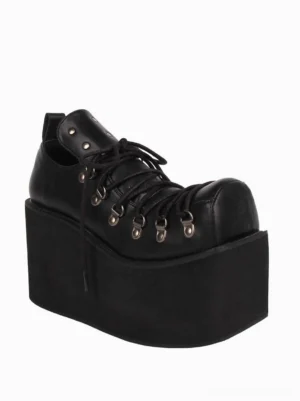 Single black gothic platform pump with high wedge sole, side three-quarter angle displaying metal eyelet details and matte PU leather finish