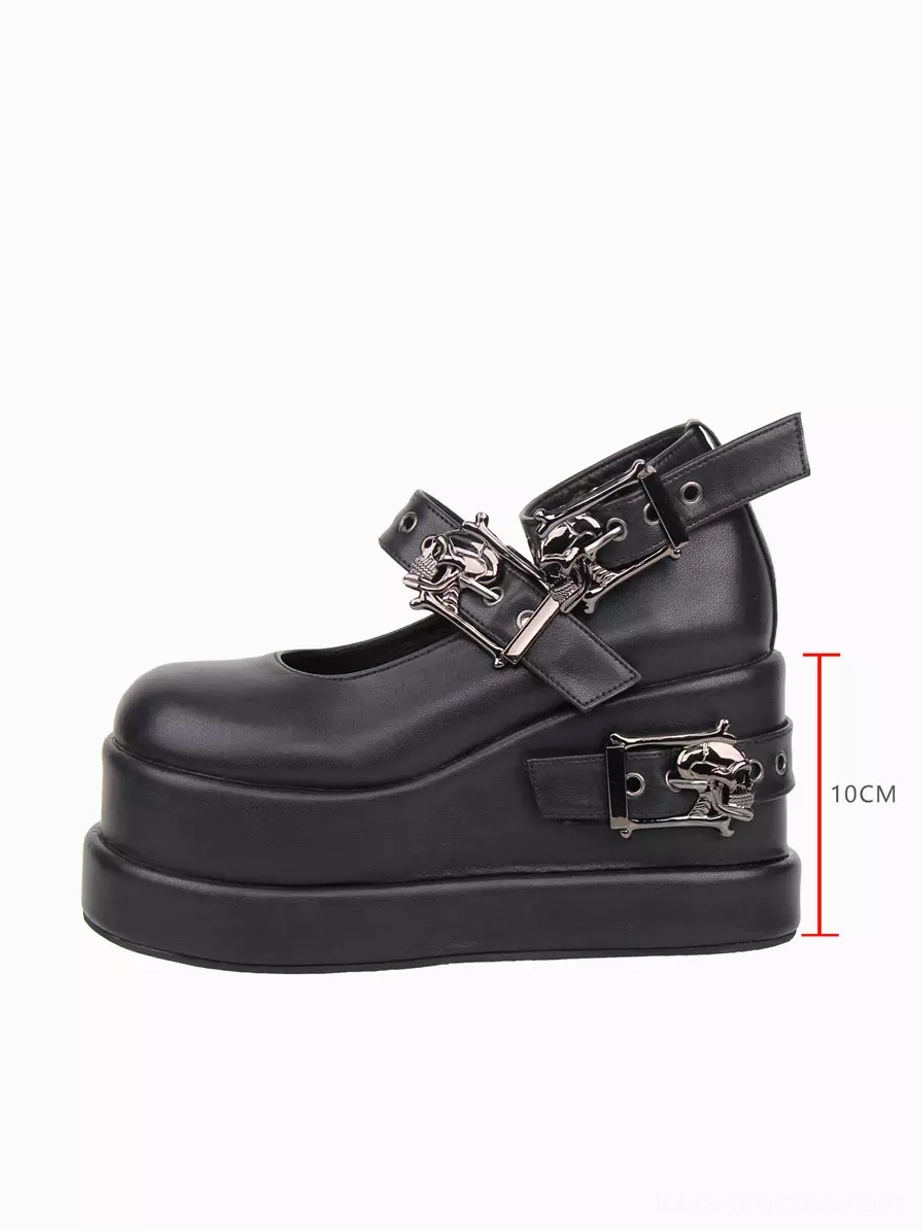 Single black Gothic Lolita platform pump right side three-quarter view displaying 10cm height rear skull buckle strap and round closed toe