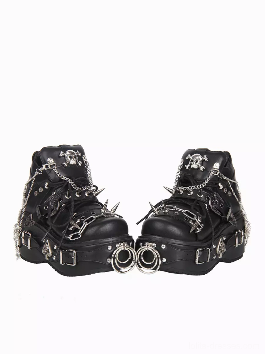 Pair of black Gothic Lolita platform pumps with intricately placed silver chains spikes and buckles side angle view