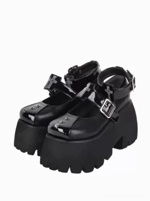Black gothic lolita platform pumps with metal rivets cross decorations buckle ankle strap front three-quarter view double shoes