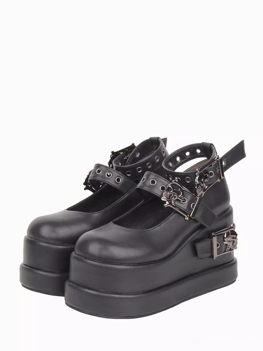 Black Gothic Lolita platform pumps pair front display view featuring round toe skull buckle straps and thick wedge sole
