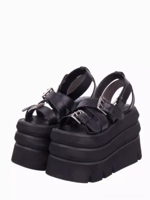 Black Gothic Lolita platform sandals front three-quarter view showing multi-buckle straps thick layered flatform sole open toe design metallic buckle details